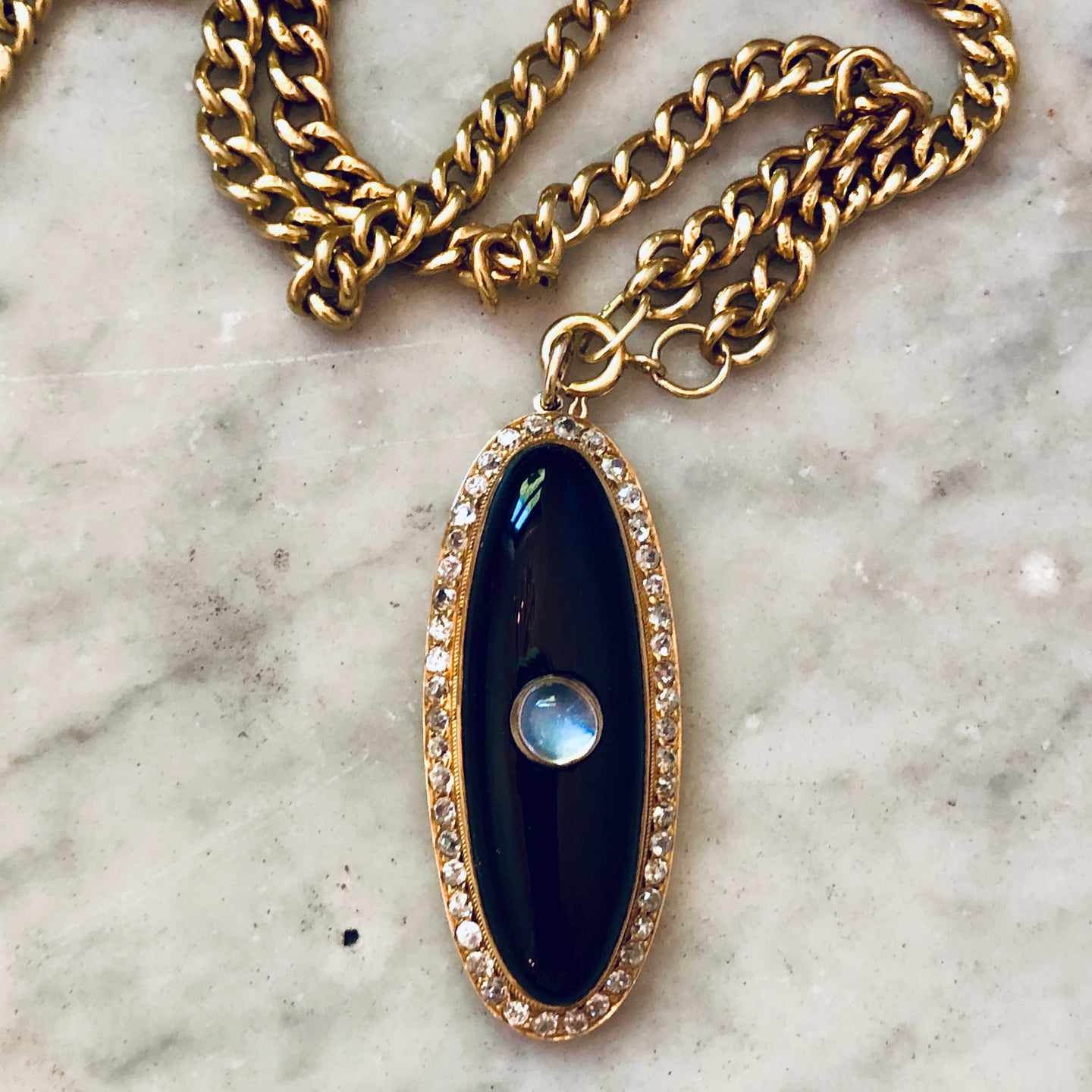 Onyx and Diamond Pendant with Central Moonstone